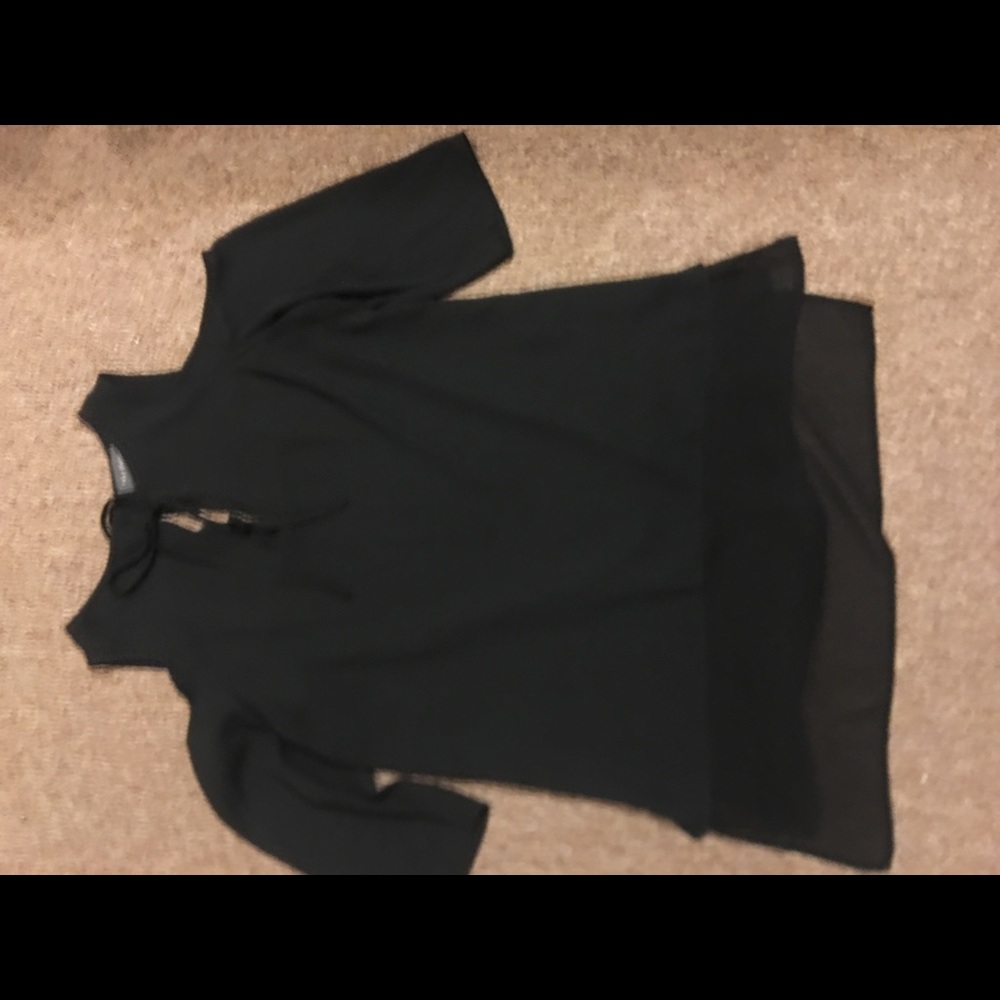 The limited black off the shoulder tank top